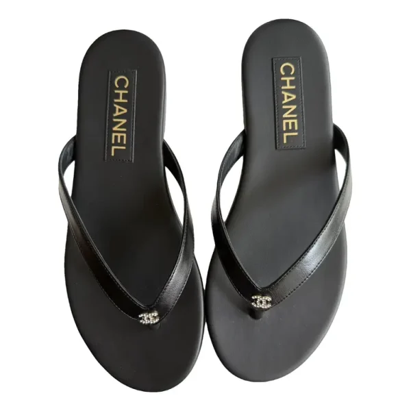 CHANEL Leather Flip Flops with Crystal CC Logo